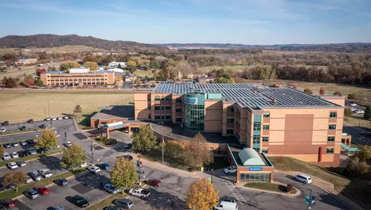 Aerial view of Gundersen Onalaska Campus displaying rooftop solar panels.